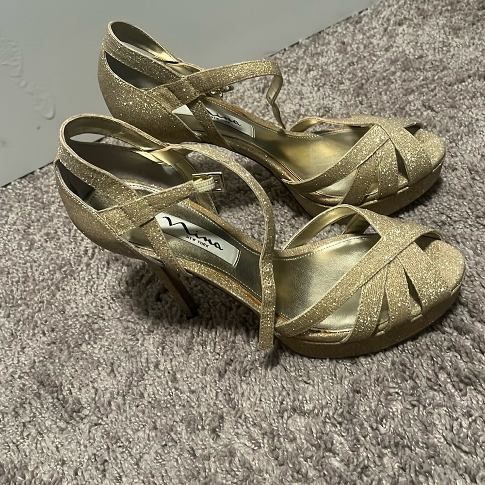 Authentic Nina Ricci gold pumps